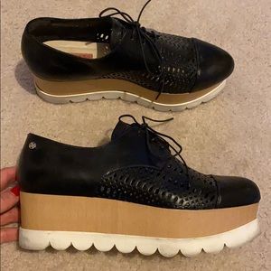 Black leather platform shoes